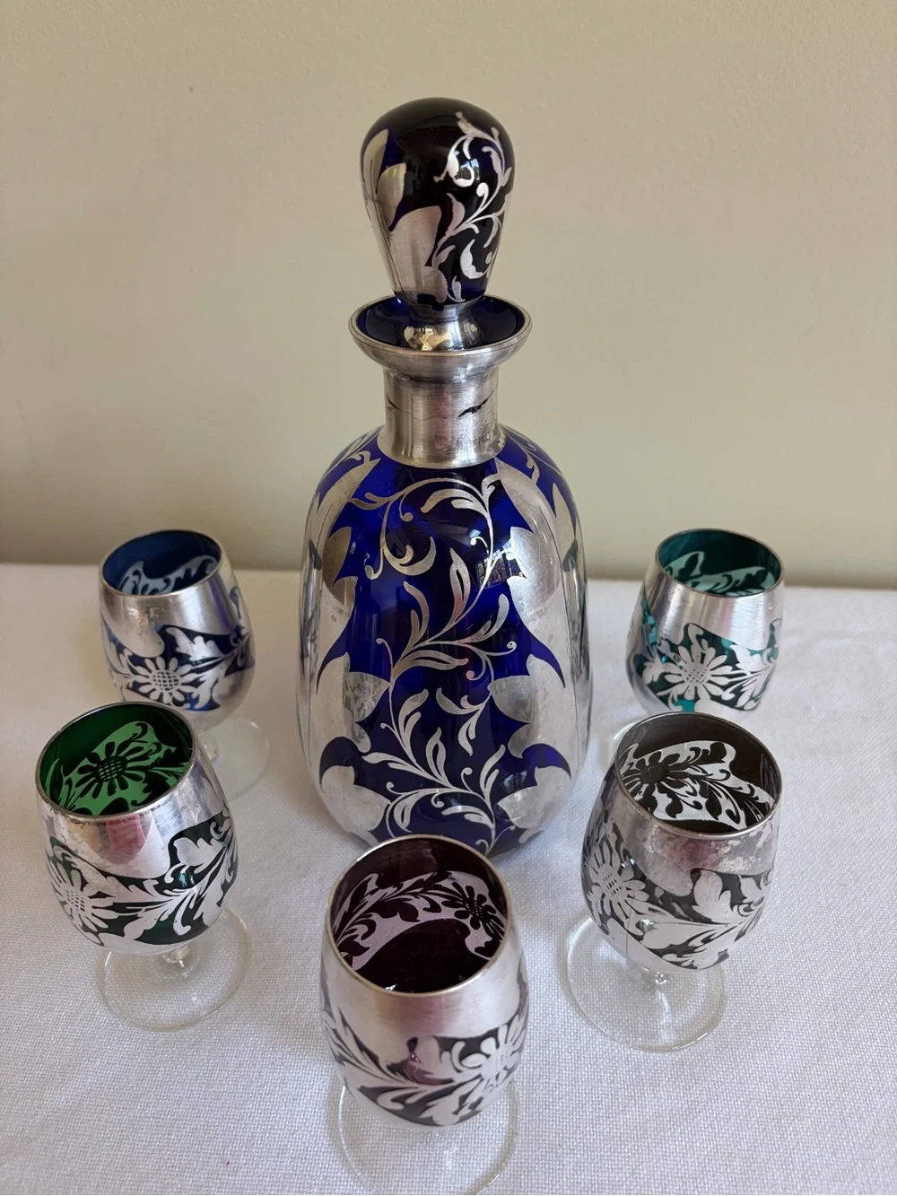 Cobalt blue glass with sterling silver over lay decanter.